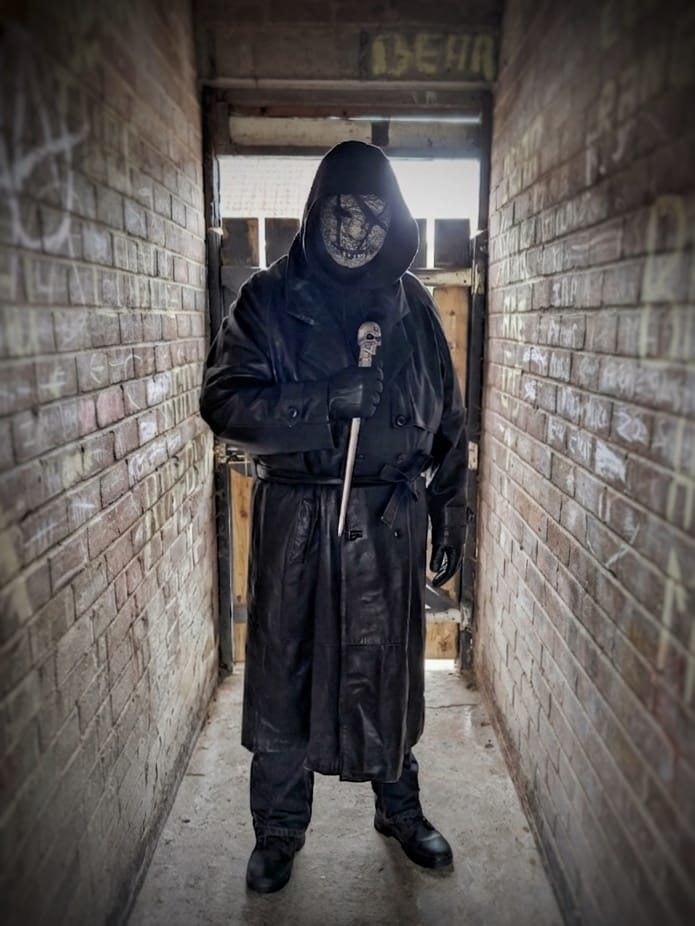 The Silence-inspired costume in a corridor